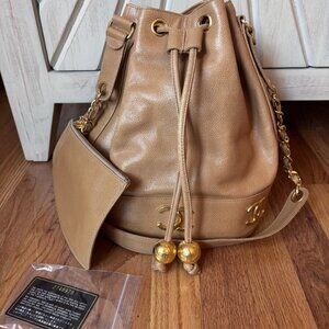 Authentic CHANEL Triple CC Caviar leather brown camel bucket back with pouch